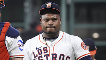 Sep 20, 2025; Houston, Texas, USA; Houston Astros starting pitcher Framber Valdez (59) walks on the field with catcher Yainer Diaz (21) before the game against the Seattle Mariners at Daikin Park. 