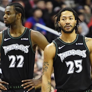 Mar 3, 2019; Washington, DC, USA; Minnesota Timberwolves forward Andrew Wiggins (22) and guard Derrick Rose (25) on the court against the Washington Wizards during the first quarter at Capital One Arena.