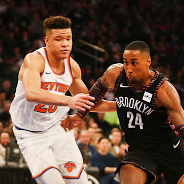 Brooklyn Nets forward Rondae Hollis-Jefferson dribbles the ball against New York Knicks forward Kevin Knox. Mandatory Credit: Andy Marlin-Imagn Images