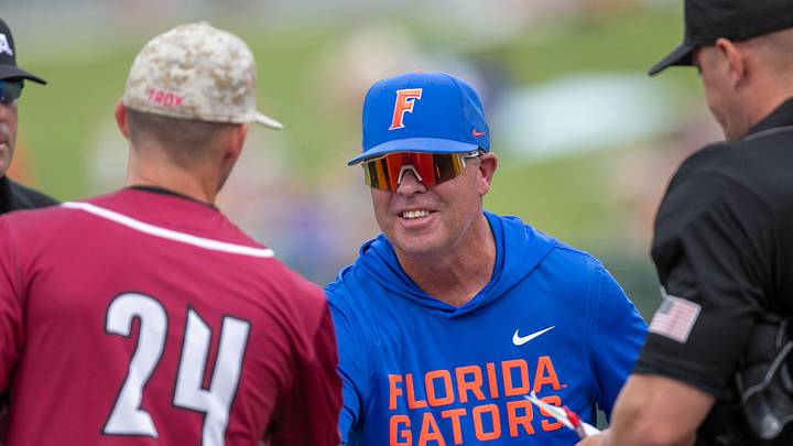Florida head coach Kevin O'Sullivan greats Troy head coach Skylar Meade before the 2026 NCAA Baseball Championship Gainesville Regional championship baseball game at Condron Family Ballpark in Gainesville, FL on Sunday, May 31, 2026. [Alan Youngblood/Gainesville Sun]