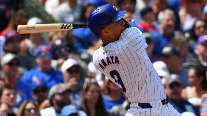 Aug 22, 2024; Chicago, Illinois, USA; Chicago Cubs catcher Miguel Amaya (9) hits a grand slam during the second inning against the Detroit Tigers at Wrigley Field. 