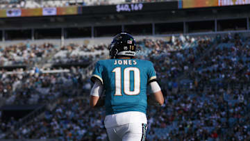Dec 15, 2024; Jacksonville, Florida, USA; Jacksonville Jaguars quarterback Mac Jones (10) practices before the snap against the New York Jets during the fourth quarter at EverBank Stadium. 