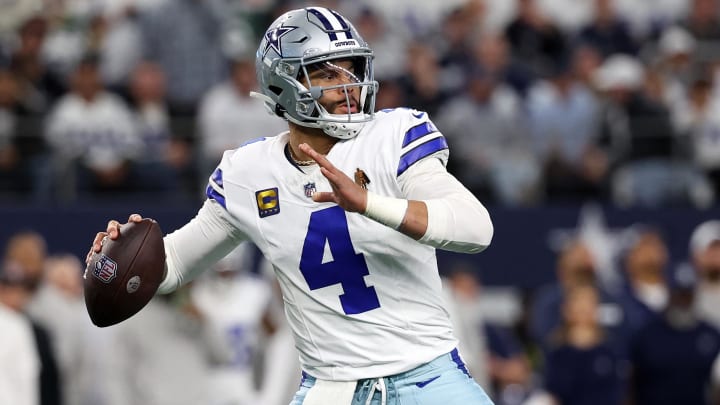Jan 14, 2024; Arlington, Texas, USA; Dallas Cowboys quarterback Dak Prescott (4) drops back to pass against the Green Bay Packers in the first half of the 2024 NFC wild card game at AT&T Stadium. Mandatory Credit: Kevin Jairaj-USA TODAY Sports