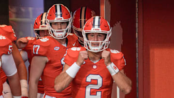 Clemson quarterback Cade Klubnik (2) and quarterback Christopher Vizzina (17) walk toward the field before the game with Clemson and Louisiana State University at Memorial Stadium in Clemson, S.C. Saturday, August 30, 2025.