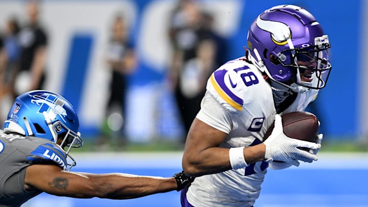 Jan 7, 2024; Detroit, Michigan, USA; Minnesota Vikings wide receiver Justin Jefferson (18) scores a touchdown against the Detroit Lions in the third quarter at Ford Field. Jan 7, 2024; Detroit, Michigan, USA; Minnesota Vikings wide receiver Justin Jefferson (18) scores a touchdown against the Detroit Lions in the third quarter at Ford Field.