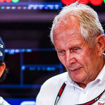 Sergio Perez of Mexico and Oracle Red Bull Racing and Oracle Red Bull Racing Team Consultant Dr Helmut Marko look on in the garage prior to Sprint Qualifying ahead of the F1 Grand Prix of Austria at Red Bull Ring on June 28, 2024 in Spielberg, Austria. 