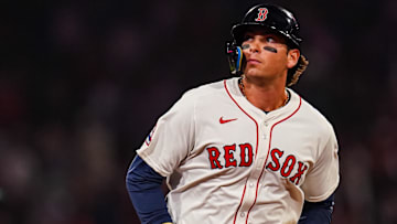 Boston Red Sox first base Triston Casas (36) hits a three-run home run against the Seattle Mariners in the seventh inning at Fenway Park.