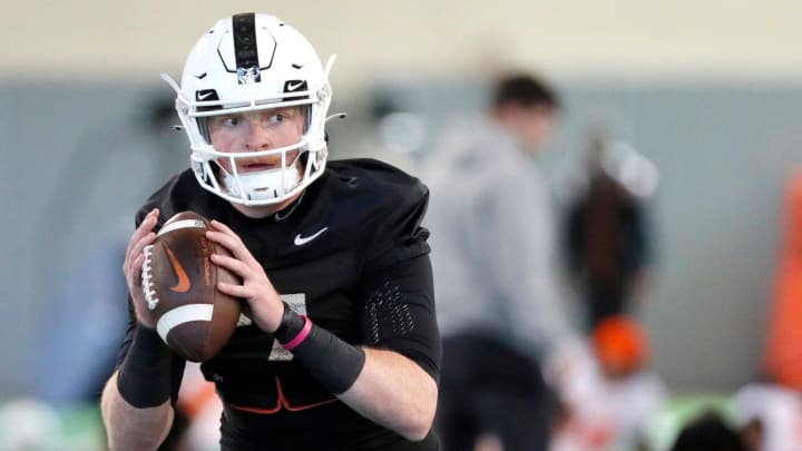Oklahoma State's Alan Bowman looks to throw a pass during an Oklahoma State University Cowboys spring football practice in Stillwater, Okla., Tuesday, March 26, 2024.