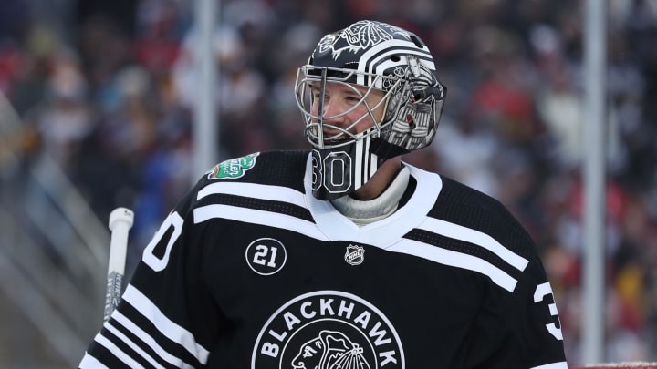 Jan 1, 2019; South Bend, IN, USA; Chicago Blackhawks goaltender Cam Ward (30) in the third period in the 2019 Winter Classic hockey game against the Boston Bruins at Notre Dame Stadium. Mandatory Credit: Aaron Doster-USA TODAY Sports