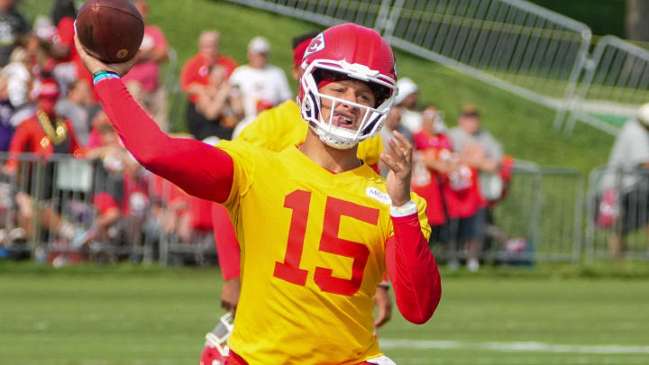 Jul 22, 2024; St. Joseph, MO, USA; Kansas City Chiefs quarterback Patrick Mahomes (15) throws a pass during training camp at Missouri Western State University. Mandatory Credit: Denny Medley-USA TODAY Sports