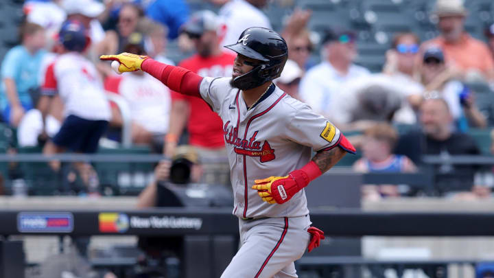 Atlanta Braves shortstop Orlando Arcia rounds the bases after hitting a solo home run against the New York Mets.