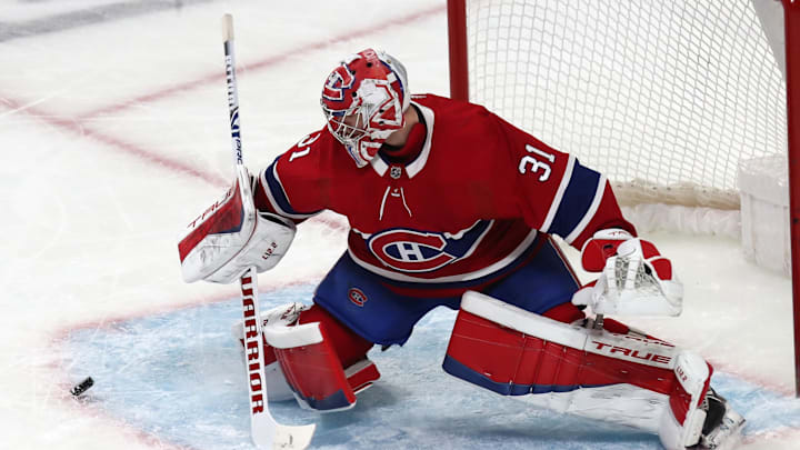 Apr 19, 2022; Montreal, Quebec, CAN; Montreal Canadiens goaltender Carey Price (31) makes a save against Minnesota Wild during the first period at Bell Centre. Mandatory Credit: Jean-Yves Ahern-Imagn Images Apr 19, 2022; Montreal, Quebec, CAN; Montreal Canadiens goaltender Carey Price (31) makes a save against Minnesota Wild during the first period at Bell Centre. Mandatory Credit: Jean-Yves Ahern-Imagn Images