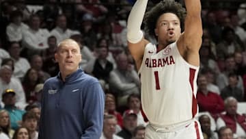Feb 22, 2025; Tuscaloosa, AL, USA; Alabama guard Mark Sears (1) shoots a three poitner in front of Kentucky head coach Mark Pope at Coleman Coliseum. Mandatory Credit: Gary Cosby Jr. USA TODAY Network via IMAGN IMAGES