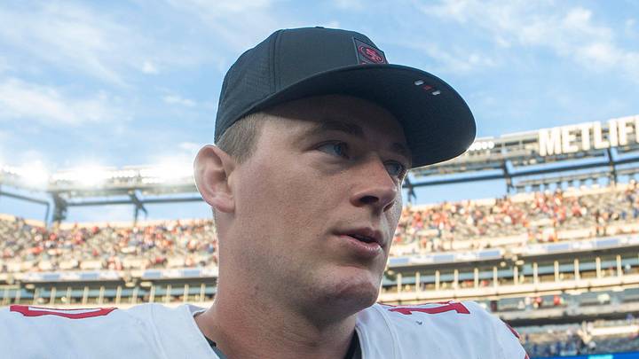 San Francisco 49ers quarterback Mac Jones walks off the field