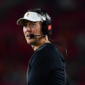 Sep 20, 2025; Los Angeles, California, USA; Southern California Trojans head coach Lincoln Riley watches game action against the Michigan State Spartans during the second half at the Los Angeles Memorial Coliseum. Mandatory Credit: Gary A. Vasquez-Imagn Images