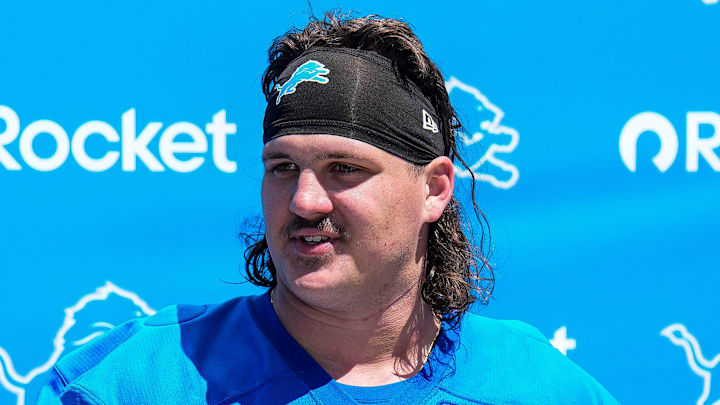 Detroit Lions offensive lineman Tate Ratledge (69) speaks after practice during rookie minicamp