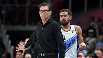 Atlanta Hawks head coach Quin Snyder signals Trae Young #11 against the Indiana Pacers.