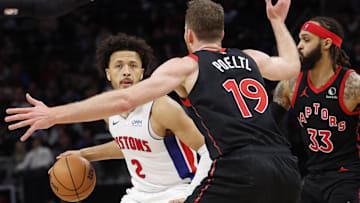 Dec 30, 2023; Detroit, Michigan, USA;  Detroit Pistons guard Cade Cunningham (2) dribbles defended