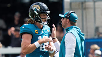 Jacksonville Jaguars quarterback Trevor Lawrence (16) and Carolina Panthers head coach Liam Coen has words during the second quarter of an NFL football game between the Carolina Panthers at Jacksonville Jaguars at EverBank Stadium Sunday September 7, 2025.