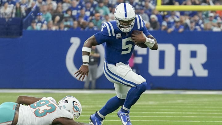 Indianapolis Colts quarterback Anthony Richardson (5) rushes with the ball during a game against the Miami Dolphins at Lucas Oil Stadium.