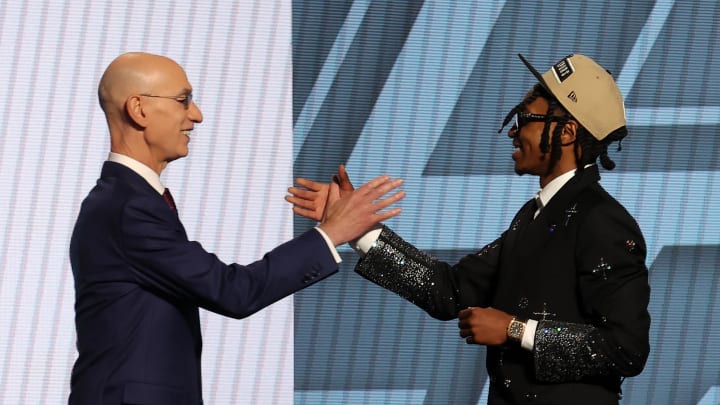 Jun 26, 2024; Brooklyn, NY, USA; Rob Dillingham shakes hands with NBA commissioner Adam Silver after being selected in the first round by the San Antonio Spurs in the 2024 NBA Draft at Barclays Center. Mandatory Credit: Brad Penner-USA TODAY Sports