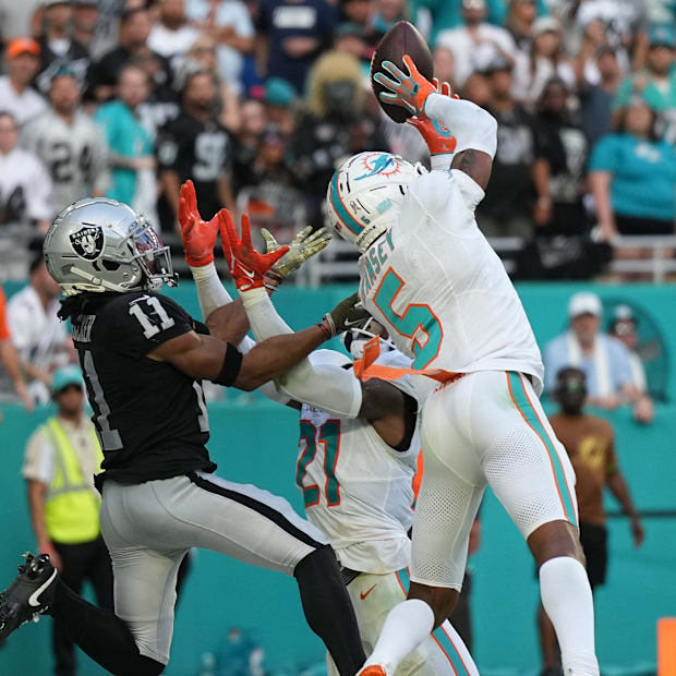 alen Ramsey (5) intercepts a pass intended for Las Vegas Raiders wide receiver Tre Tucker
