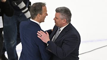 Tampa Bay Lightning head coach Jon Cooper (left) shakes hands with Sheldon Keefe. Mandatory Credit: Dan Hamilton-Imagn Images