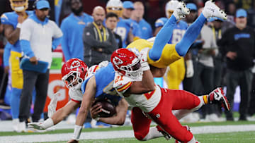 [US, Mexico & Canada customers only] Sep 5, 2025; Sao Paulo, BRAZIL; Kansas City Chiefs safety Jaden Hicks (21) and linebacker Drue Tranquill (23) in action with Los Angeles Chargers quarterback Justin Herbert (10) in the first half during a NFL game at Corinthians Arena. Mandatory Credit: Amanda Perobelli/Reuters via Imagn Images