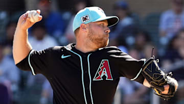 Arizona Diamondbacks pitcher Corbin Burnes throws to the Colorado Rockies in his debut on opening day of the spring training season at Salt River Fields at Talking Stick in Scottsdale on Feb. 21, 2025.
