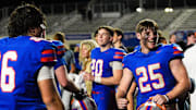 Bolles running back Xander Edwards (25) celebrates the Bulldogs' win over Cardinal Gibbons in the FHSAA Class 2A semifinal at Bolles School in Jacksonville on Dec. 5, 2025. Bolles will take on Sarasota Cardinal Mooney for the state title on Wednesday, Dec. 10, in Miami,