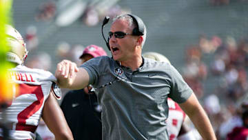 Florida State Seminoles head coach Mike Norvell pats a player on the back after a play. Seminole fans watched as the Florida State football team hosted the FSU Garnet and Gold Spring Showcase on Saturday, April 15, 2023.

Fsu Spring Game708