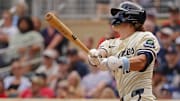 Aug 10, 2025; Minneapolis, Minnesota, USA; Minnesota Twins second baseman Luke Keaschall (15) hits a two-run walk-off home run against the Kansas City Royals in the 11th inning at Target Field.