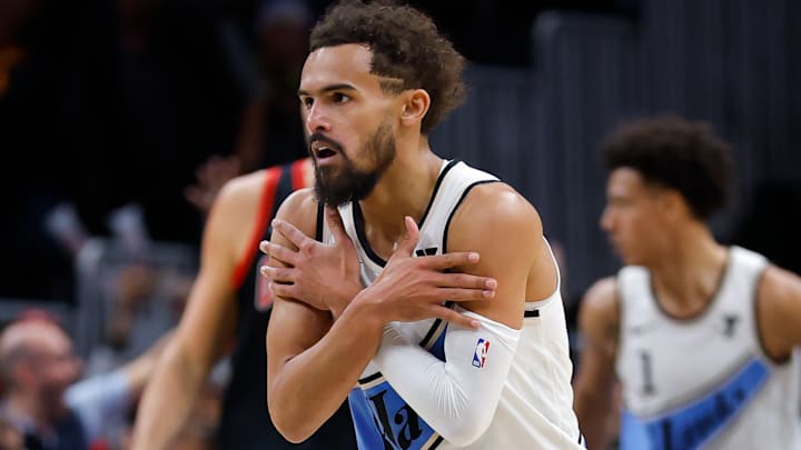 Trae Young #11 of the Atlanta Hawks reacts after a basket against the Chicago Bulls.