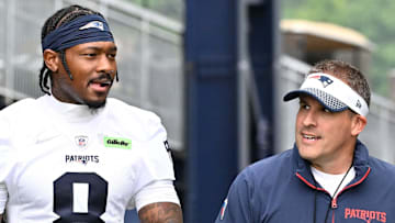 Jun 9, 2025; Foxborough, MA, USA; New England Patriots wide receiver Stefon Diggs (8) and offensive coordinator Josh McDaniels walk to the practice fields at Gillette Stadium. Mandatory Credit: Eric Canha-Imagn Images