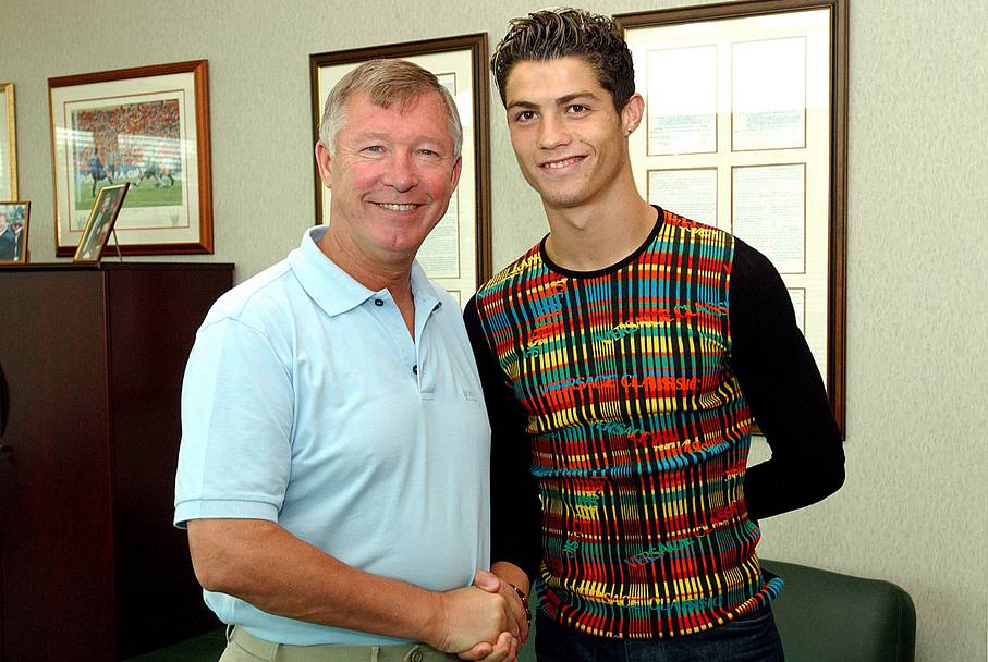 Cristiano Ronaldo (right) shaking Sir Alex Ferguson’s hand.
