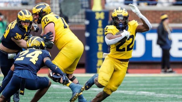 Maize Team running back Tavierre Dunlap (22) runs against Blue Team during the second half of the spring game at Michigan Sta