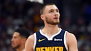 Oct 25, 2025; Denver, Colorado, USA; Denver Nuggets guard Christian Braun (0) walks back to the bench after a play during the first half against the Phoenix Suns at Ball Arena.