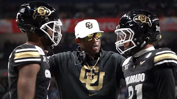 Deion Sanders with sons at Alamo Bowl 