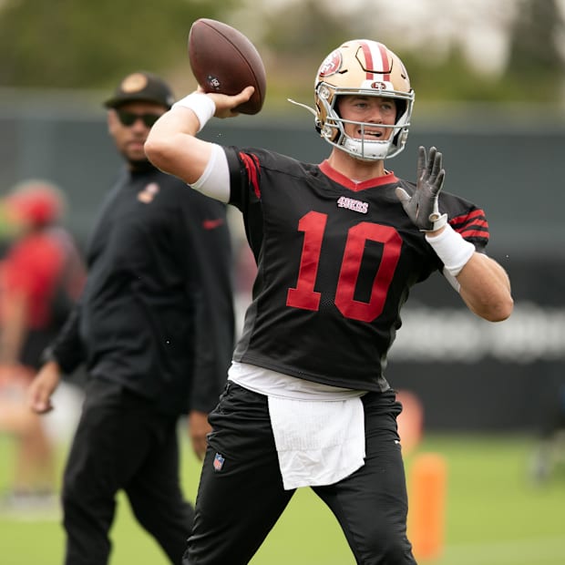 San Francisco 49ers quarterback Mac Jones (10) works on his footwork in the pocket during the second day of training camp.