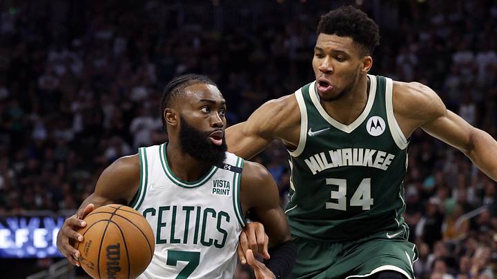 May 13, 2022; Milwaukee, Wisconsin, USA;  Boston Celtics guard Jaylen Brown (7) drives for the basket around Milwaukee Bucks forward Giannis Antetokounmpo (34) during the fourth quarter during game six of the second round for the 2022 NBA playoffs at Fiserv Forum. Mandatory Credit: Jeff Hanisch-Imagn Images