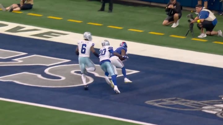 New York Giants wide receiver Malik Nabers catches a 48-yard pass from Russell Wilson against the Dallas Cowboys.