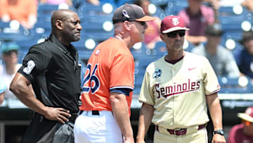 Jun 16, 2024; Omaha, NE, USA;  Virginia Cavalier head coach Brian O'Connor and Florida State Seminoles head coach Link Jarrett meet before the game at Charles Schwab Field Omaha. Mandatory Credit: Steven Branscombe-Imagn Images