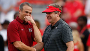 South Carolina football coach Shane Beamer with Georgia Bulldogs head coach Kirby Smart