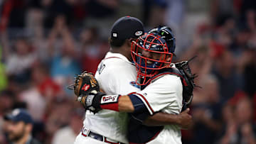 Oct 7, 2018; Atlanta, GA, USA; Atlanta Braves relief pitcher Arodys Vizcaino (38) hugs catcher Kurt Suzuki (24) after defeating the Los Angeles Dodgers in game three of the 2018 NLDS playoff baseball series at SunTrust Park. Mandatory Credit: Brett Davis-Imagn Images