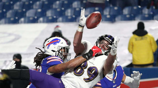 Mark Andrews fights for a catch