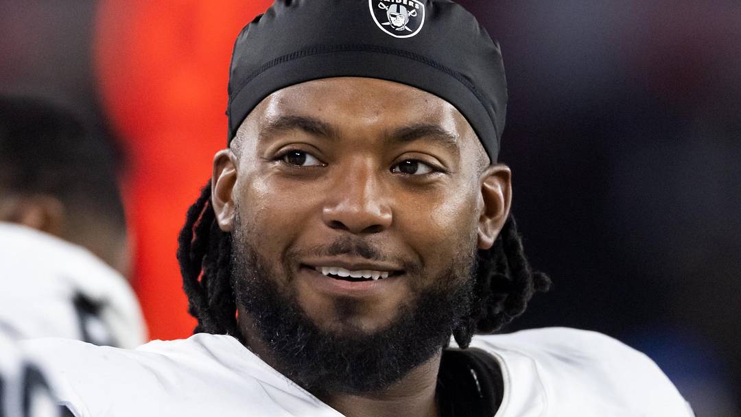 Aug 23, 2025; Glendale, Arizona, USA; Las Vegas Raiders defensive tackle Adam Butler (69) against the Arizona Cardinals during a preseason NFL game at State Farm Stadium. Mandatory Credit: Mark J. Rebilas-Imagn Images