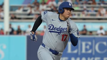 Aug 1, 2025; St. Petersburg, Florida, USA;  Los Angeles Dodgers designated hitter Shohei Ohtani (17) runs to third base