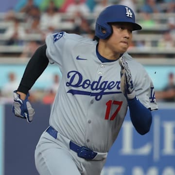 Aug 1, 2025; St. Petersburg, Florida, USA;  Los Angeles Dodgers designated hitter Shohei Ohtani (17) runs to third base