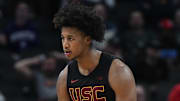 Mar 12, 2025; Indianapolis, IN, USA; USC Trojans guard Wesley Yates III (6) celebrates after a play during the second half against the Rutgers Scarlet Knights at Gainbridge Fieldhouse. Mandatory Credit: Robert Goddin-Imagn Images
