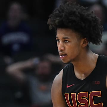 Mar 12, 2025; Indianapolis, IN, USA; USC Trojans guard Wesley Yates III (6) celebrates after a play during the second half against the Rutgers Scarlet Knights at Gainbridge Fieldhouse. Mandatory Credit: Robert Goddin-Imagn Images